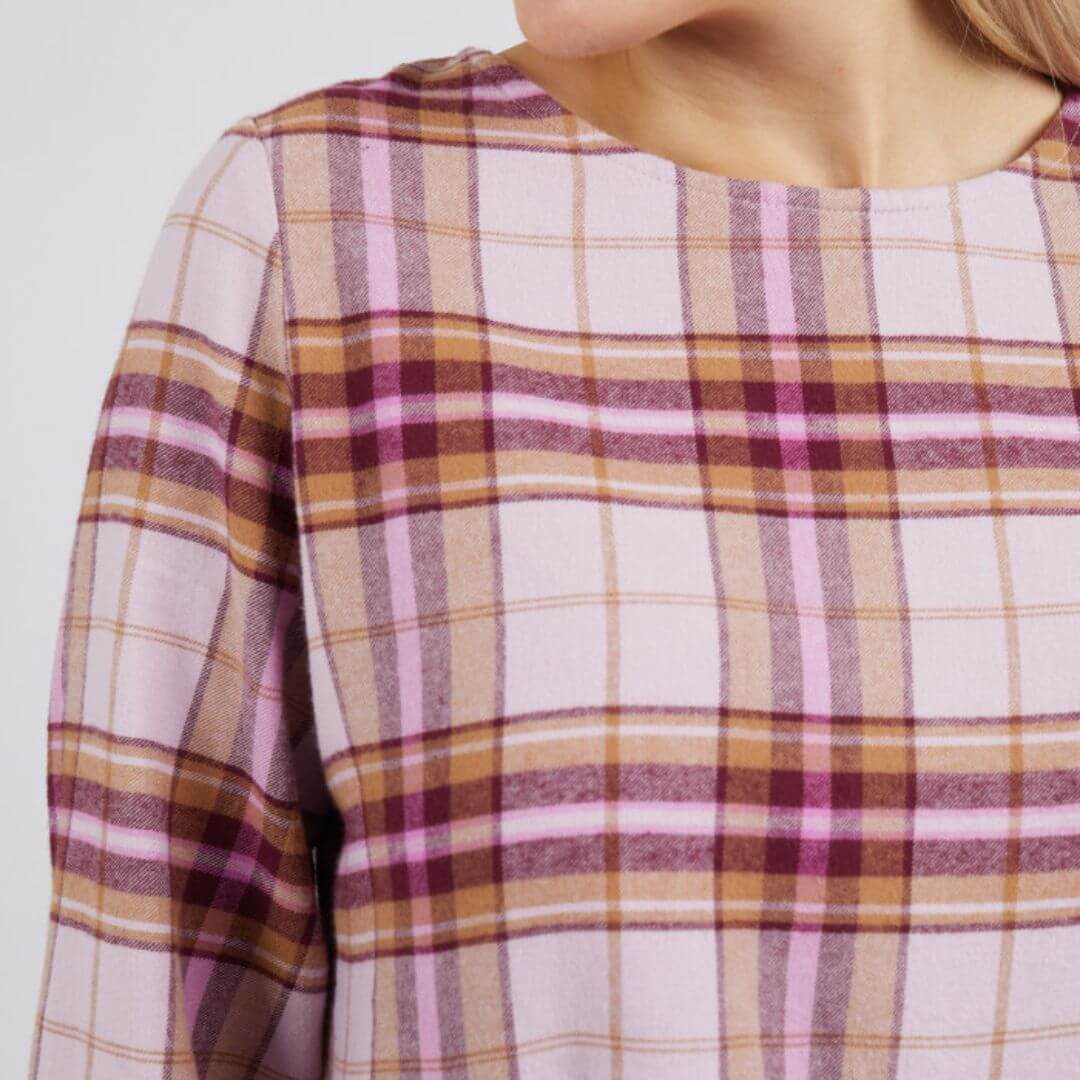 a luxe soft brushed cotton blend and features a beautiful wine coloured check in a mid length style.