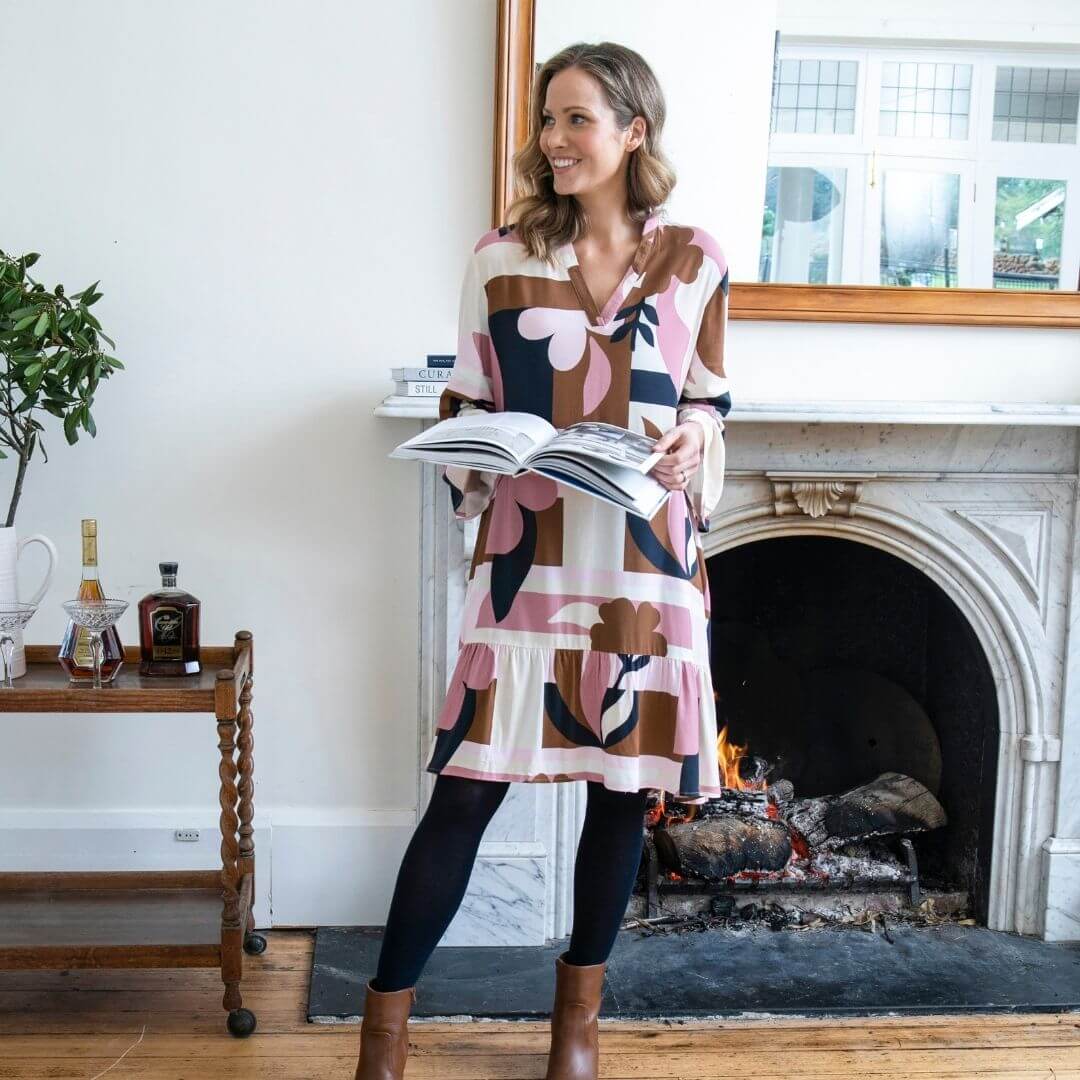 Featuring an Elm exclusive print, the Abstraction Dress is a knee length dress on a cream base with dusty pink, chocolate and navy print. with frill detail at the sleeve and hem adds a playful and feminine touch.