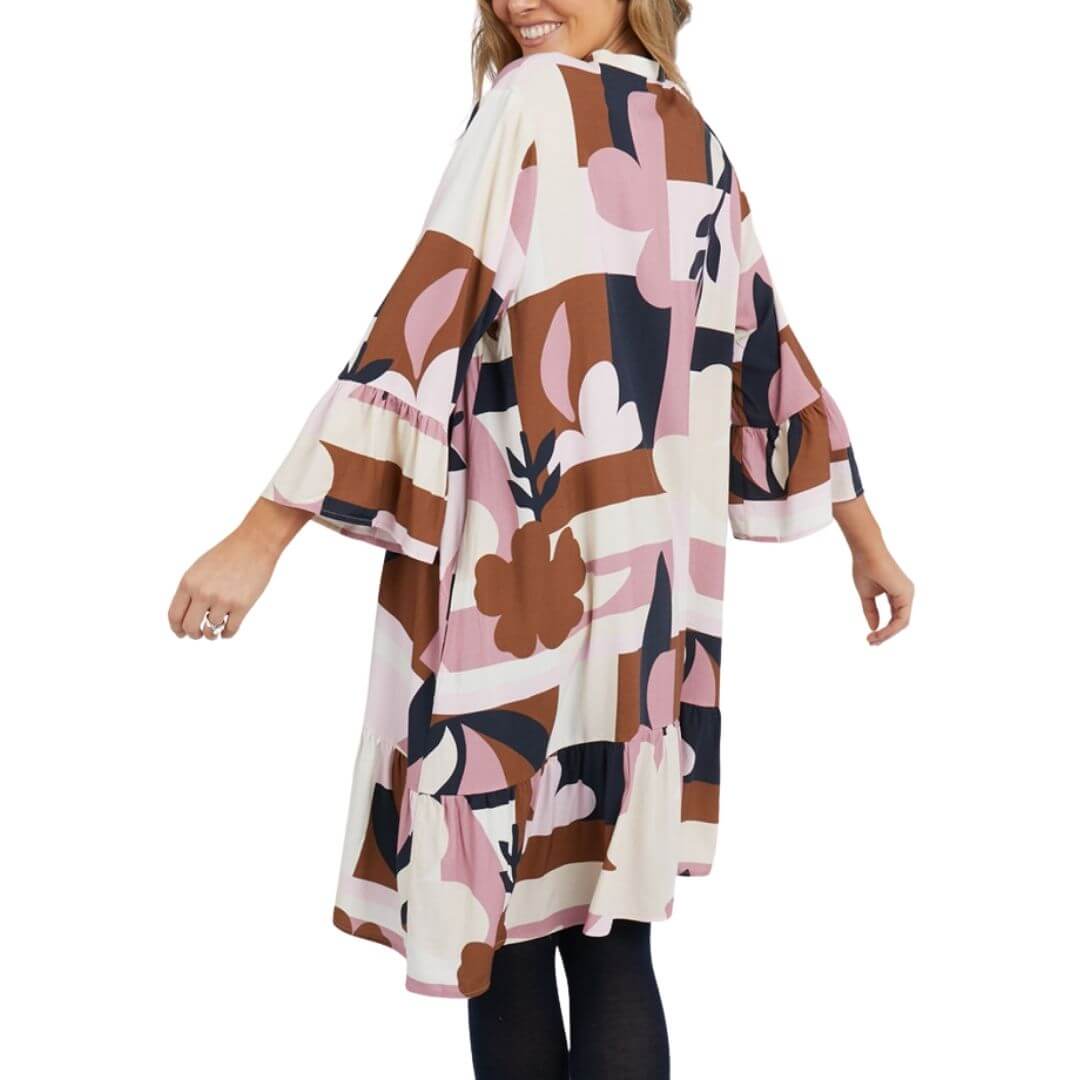 Featuring an Elm exclusive print, the Abstraction Dress is a knee length dress on a cream base with dusty pink, chocolate and navy print. with frill detail at the sleeve and hem adds a playful and feminine touch.