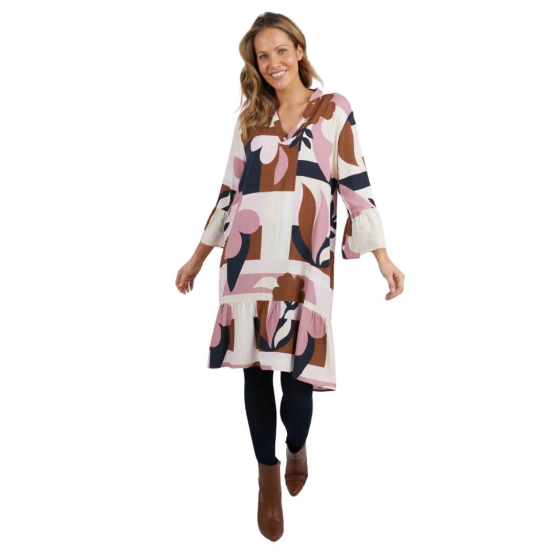Featuring an Elm exclusive print, the Abstraction Dress is a knee length dress on a cream base with dusty pink, chocolate and navy print. with frill detail at the sleeve and hem adds a playful and feminine touch.