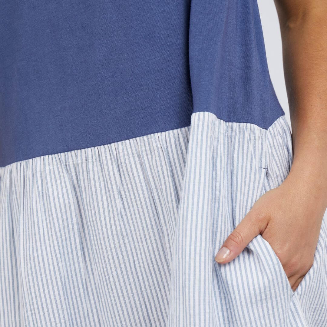 The Matilda Stripe dress features a with round neck, pull over tee style blue jersey top, half and a woven tiered panels on the bottom and our favourite - functional pockets!!!