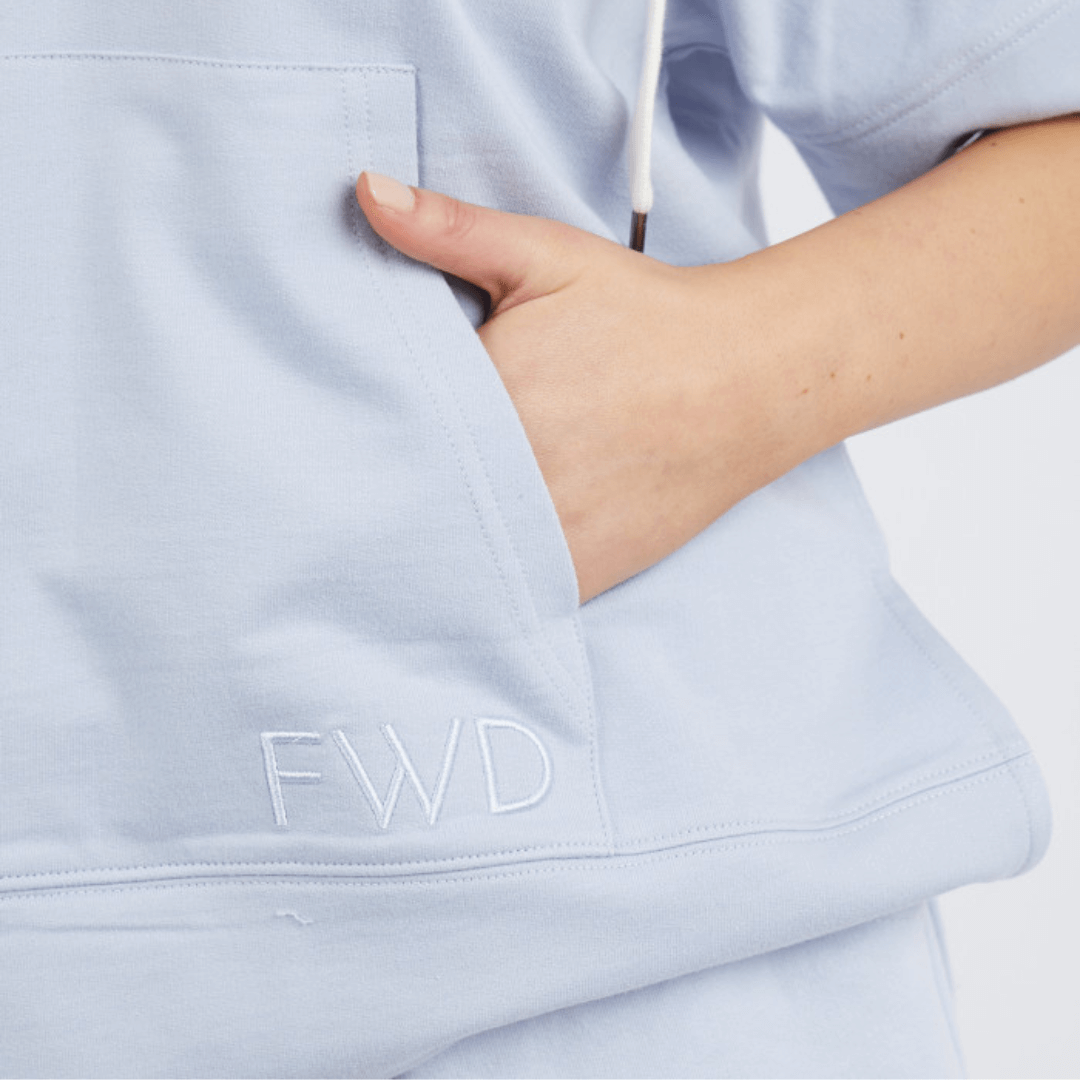 The Barre Hoody from Foxwood Leisure is a cosy and fresh short sleeve fleece that features a flattering V neck with drawcord hood and the ideal weight to go to-for your day-to-day activities. Available in store and online and Not Plain Jane.