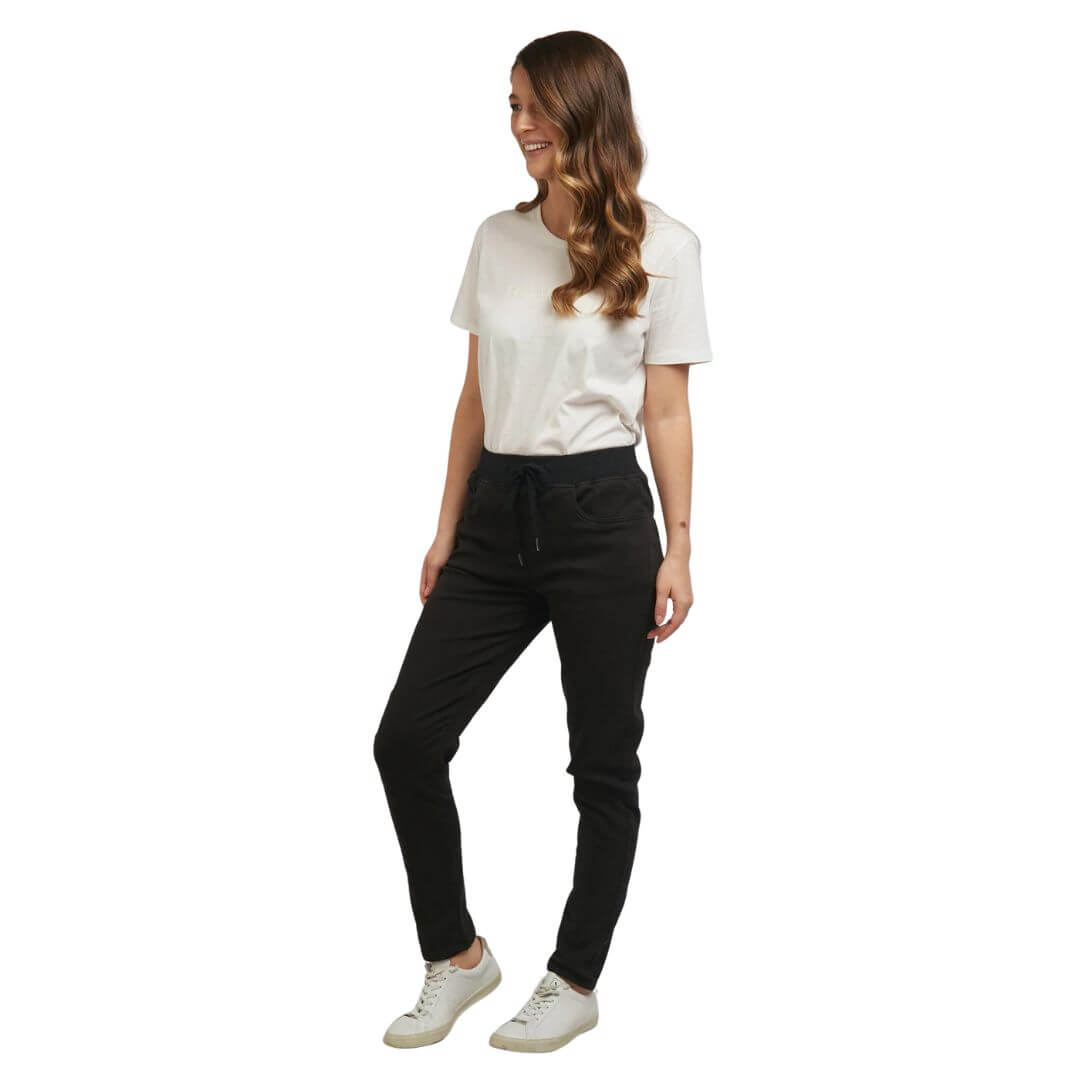 The black Sylvia joggers from Foxwood Clothing feature 2 side pockets, 2 back pockets, and an elastic waistline with a soft drawstring. Available in store and online at Foxwood Clothing stockist Not Plain Jane.