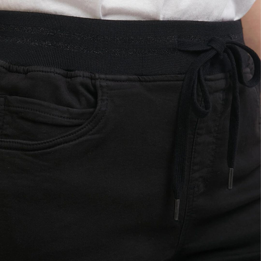 The black Sylvia joggers from Foxwood Clothing feature 2 side pockets, 2 back pockets, and an elastic waistline with a soft drawstring. Available in store and online at Foxwood Clothing stockist Not Plain Jane.