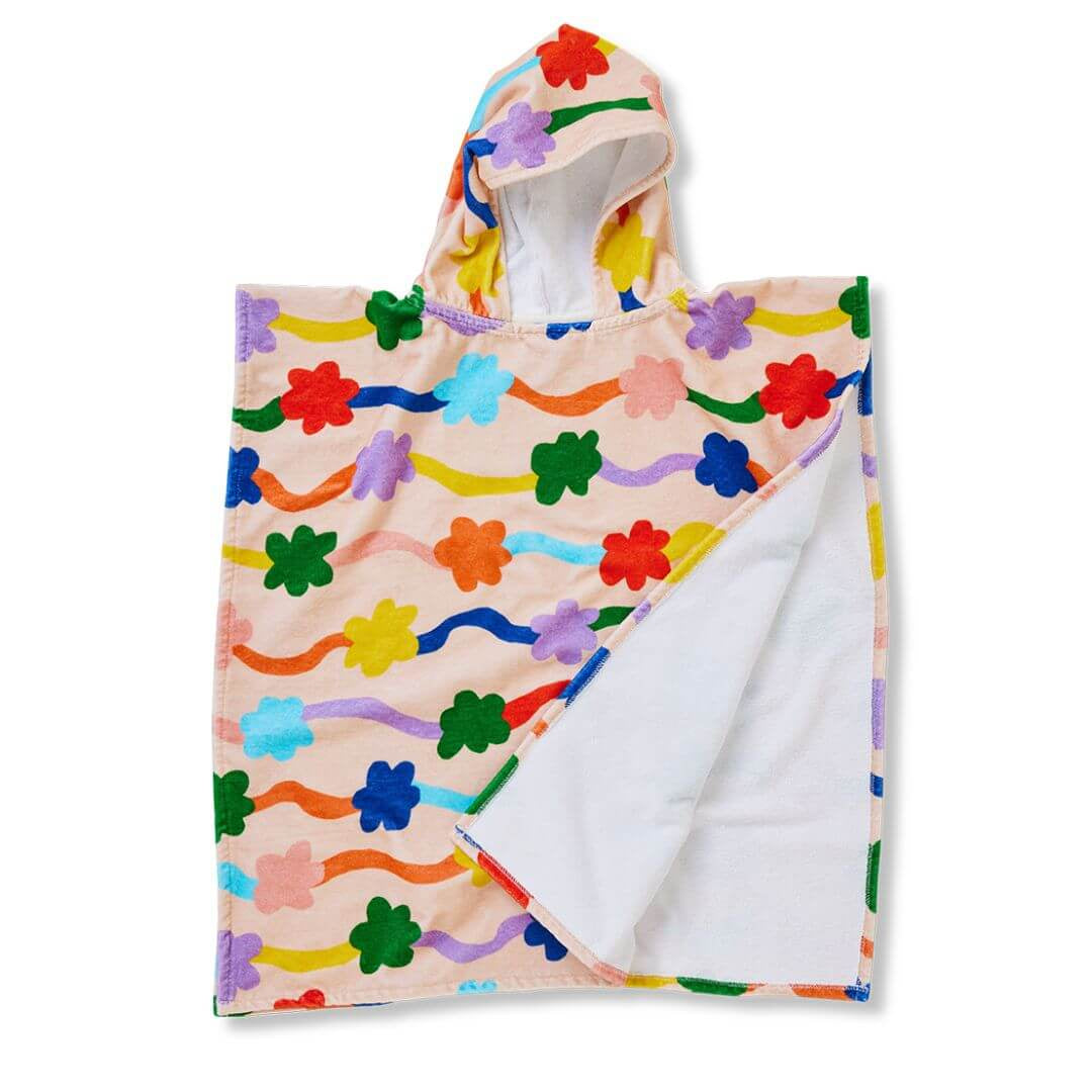 Snuggle up in style with the super soft hooded towels from Halcyon Nights. Made with 100% cotton, these are a summer essential ! The Flower Flow print features bright and colourful flowers and squiggles on a peach base jersey.