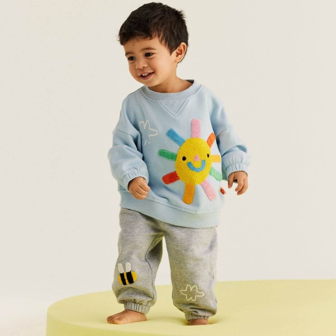 The Halcyon Nights Winter sun jogger in grey are made from a french terry and feature a super cute bumble bee applique on the bottom of the leg