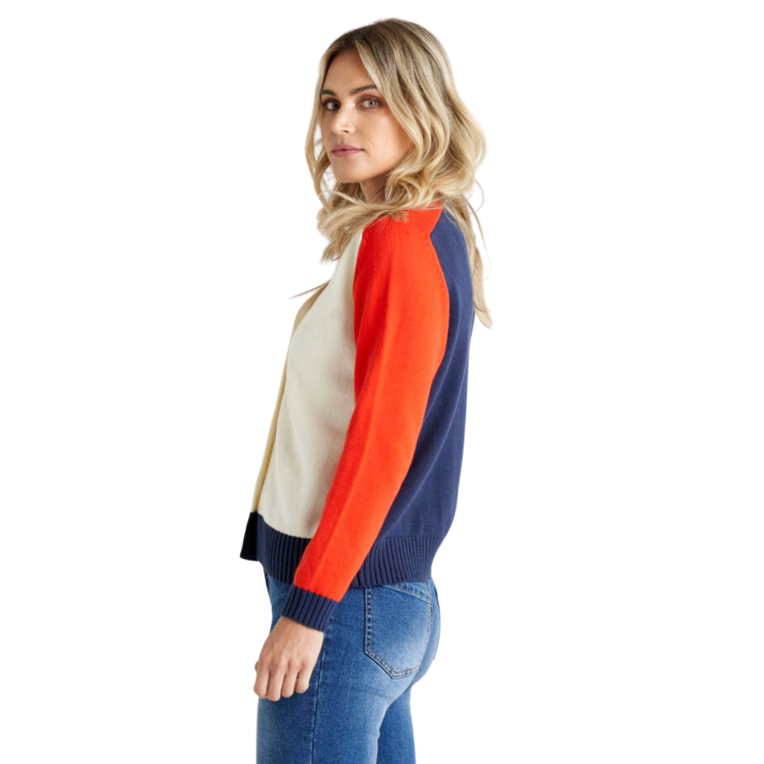 With its relaxed fit and long sleeves, the J'Adore cardigan from Betty Basics is all about cozy vibes and effortless coolness. Featuring a cream button up front, tomato red sleeves, navy back and navy banding around the hem and cuffs, the J'Adore can be worn open as a cardi or buttoned up sweater style.