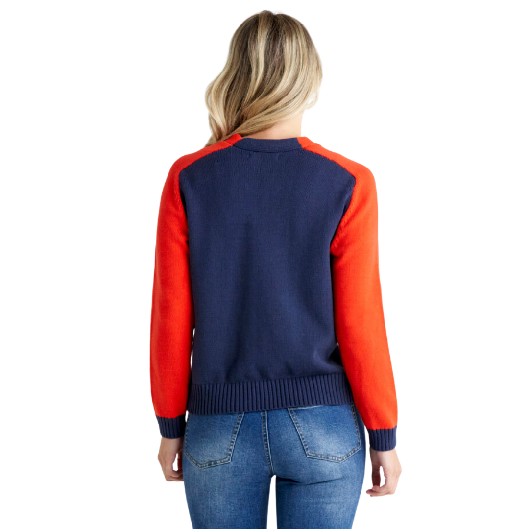 With its relaxed fit and long sleeves, the J'Adore cardigan from Betty Basics is all about cozy vibes and effortless coolness. Featuring a cream button up front, tomato red sleeves, navy back and navy banding around the hem and cuffs, the J'Adore can be worn open as a cardi or buttoned up sweater style.