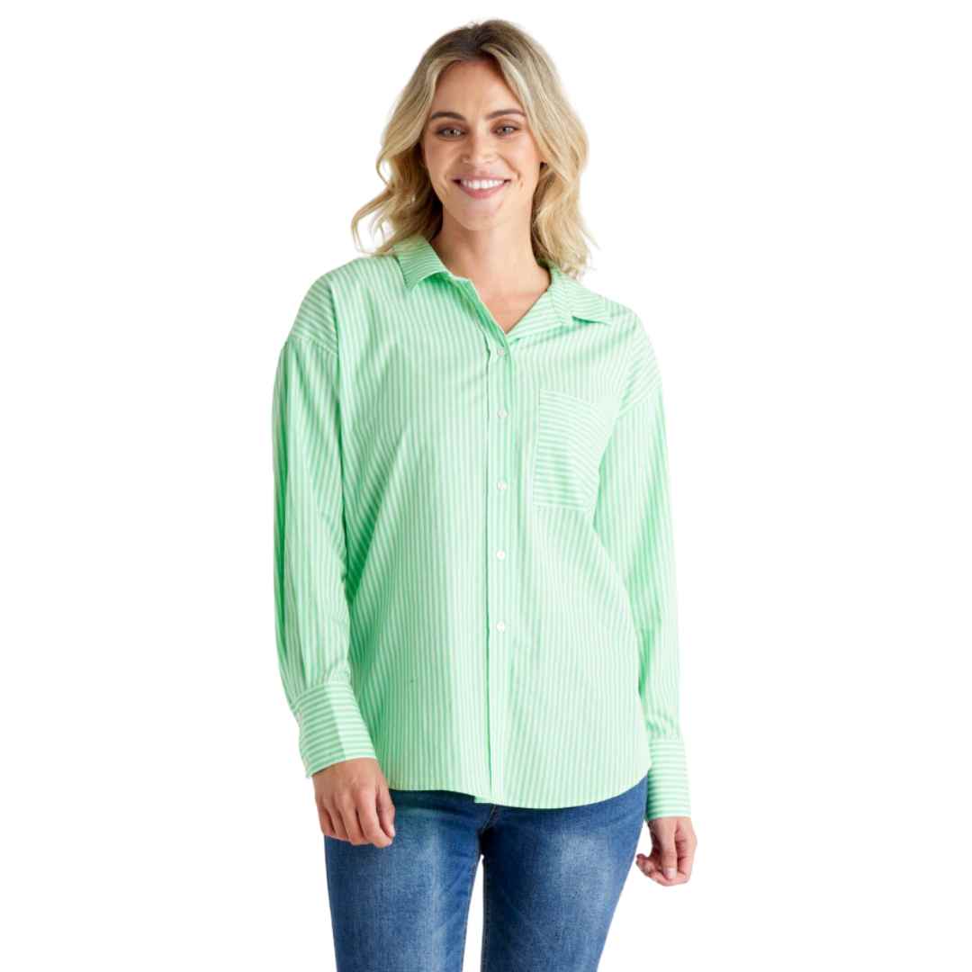 The Saskia Shirt from Betty Bascis in apple is a classic oversized shirt featuring a green and white vertical stripe. With a classic collar and button front placket, this shirt combines timeless style with a fun twist. The relaxed body fit ensures comfort and a carefree vibe.