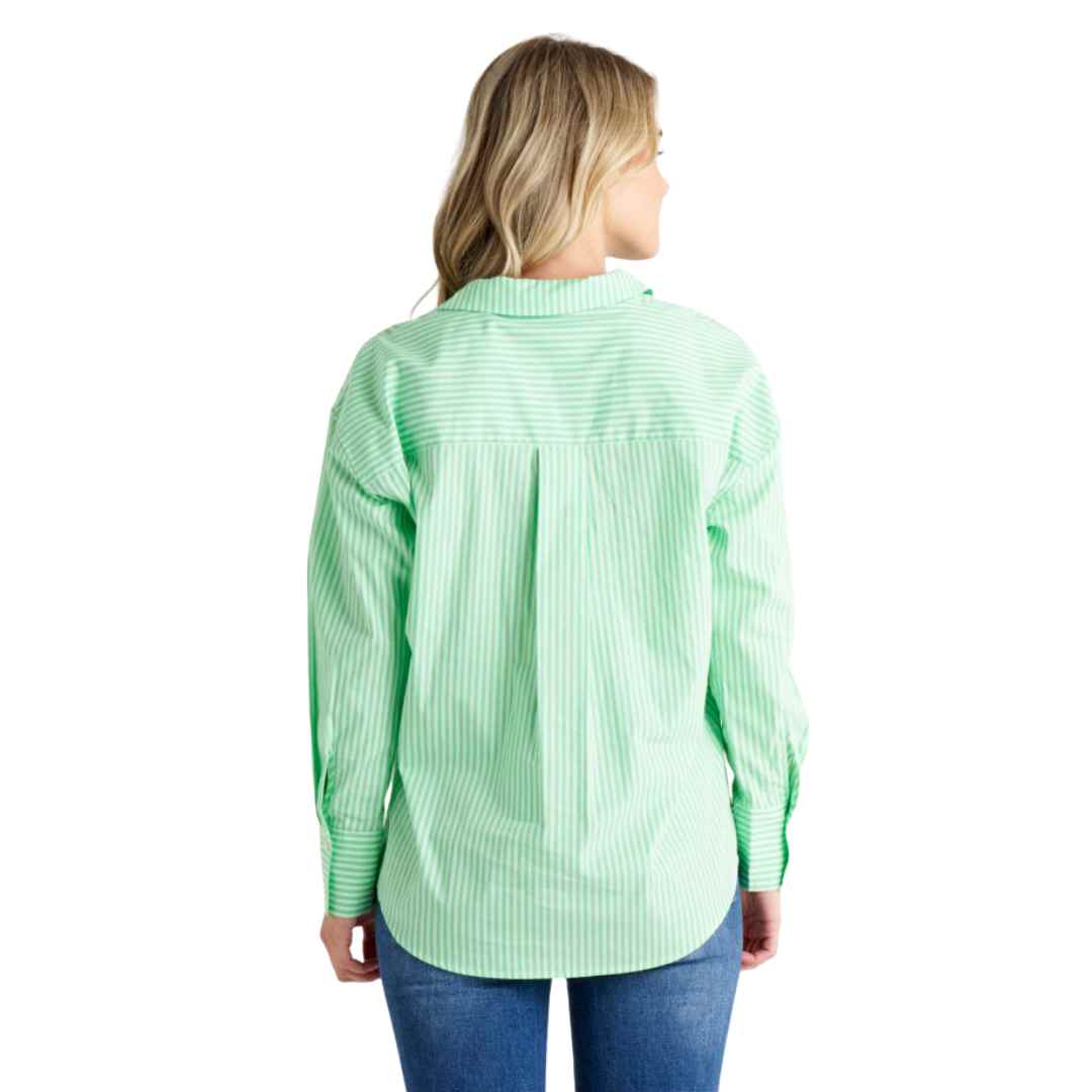 The Saskia Shirt from Betty Bascis in apple is a classic oversized shirt featuring a green and white vertical stripe. With a classic collar and button front placket, this shirt combines timeless style with a fun twist. The relaxed body fit ensures comfort and a carefree vibe.