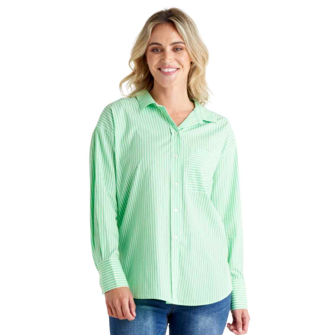 The Saskia Shirt from Betty Bascis in apple is a classic oversized shirt featuring a green and white vertical stripe. With a classic collar and button front placket, this shirt combines timeless style with a fun twist. The relaxed body fit ensures comfort and a carefree vibe.