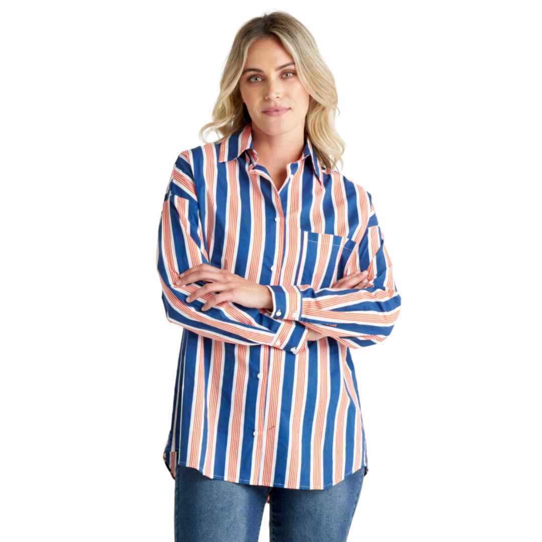 Featuring a curved front and back hem, it's all about flattering silhouettes and playful movement. The Saskia Shirt from Betty Basics features a royal blue and tomato vertical stripe 