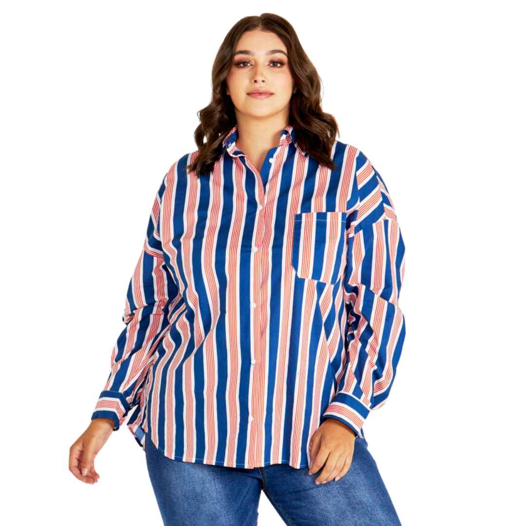 Featuring a curved front and back hem, it's all about flattering silhouettes and playful movement. The Saskia Shirt from Betty Basics features a royal blue and tomato vertical stripe 