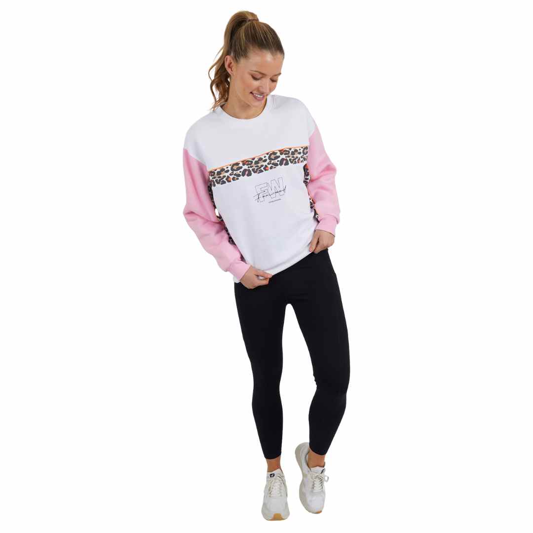 The Leopard crew from the Foxwood Leisure collection is a white crew with pink sleeves featuring a pop of leopard print across the chest and inside of the sleeves