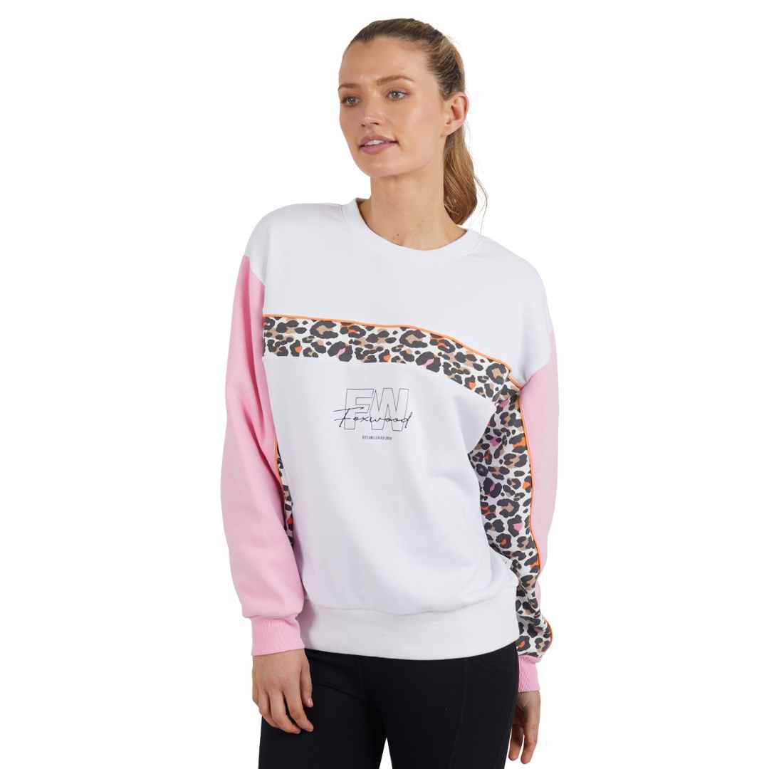 The Leopard crew from the Foxwood Leisure collection is a white crew with pink sleeves featuring a pop of leopard print across the chest and inside of the sleeves