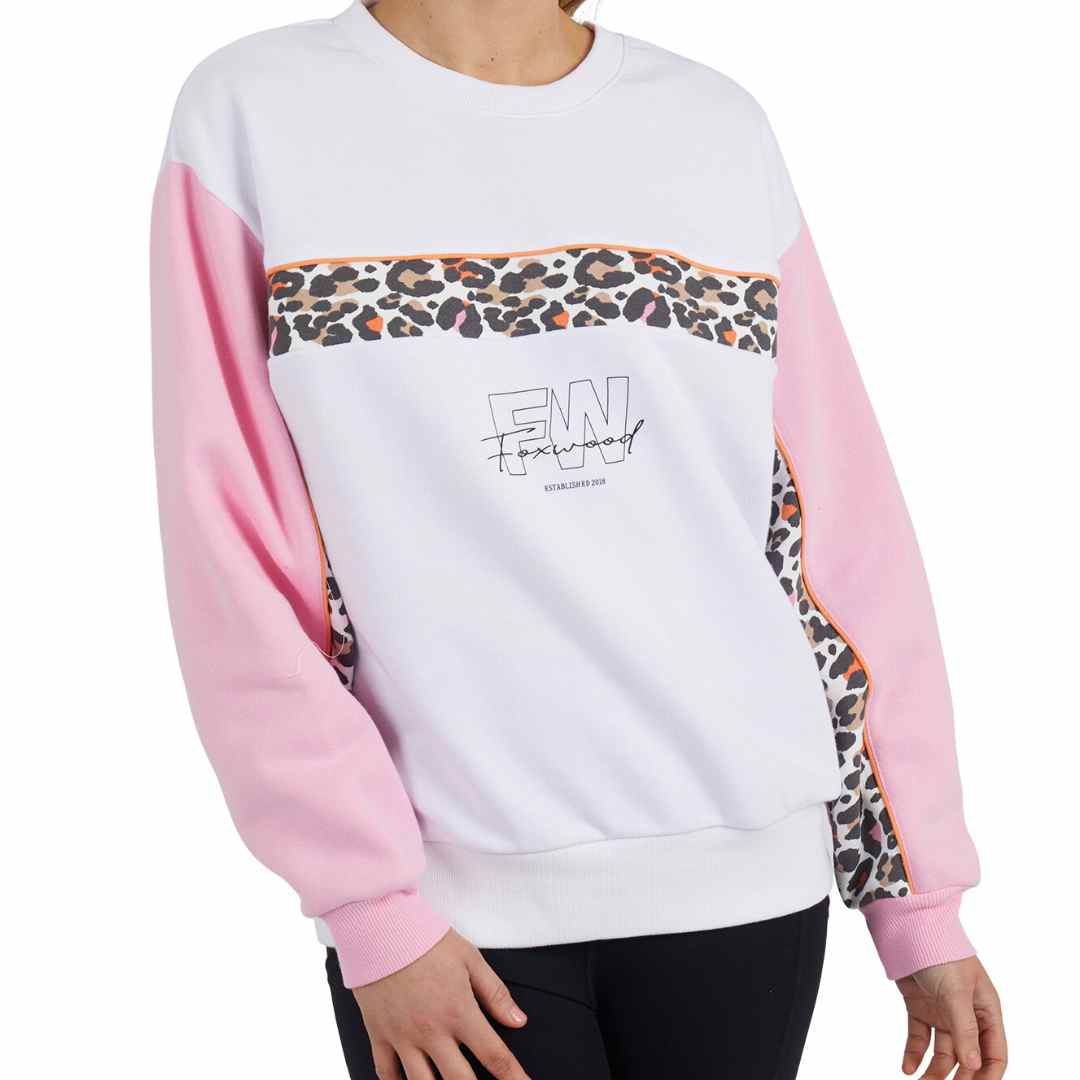 The Leopard crew from the Foxwood Leisure collection is a white crew with pink sleeves featuring a pop of leopard print across the chest and inside of the sleeves