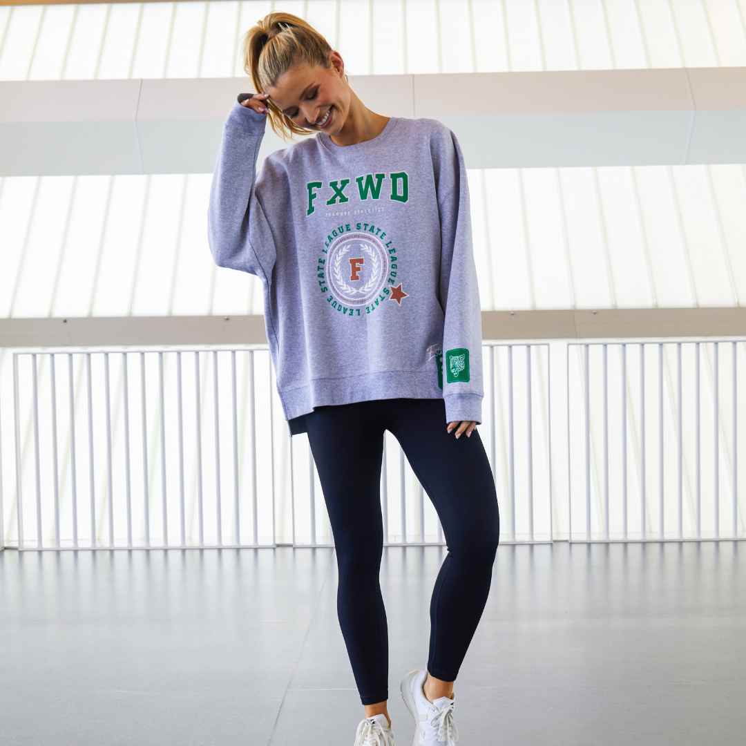 Made from a cosy brushed fleece, the college-style print on the body sleeve and hem gives this slouch-fit Get There crew from Foxwood a few fun details.