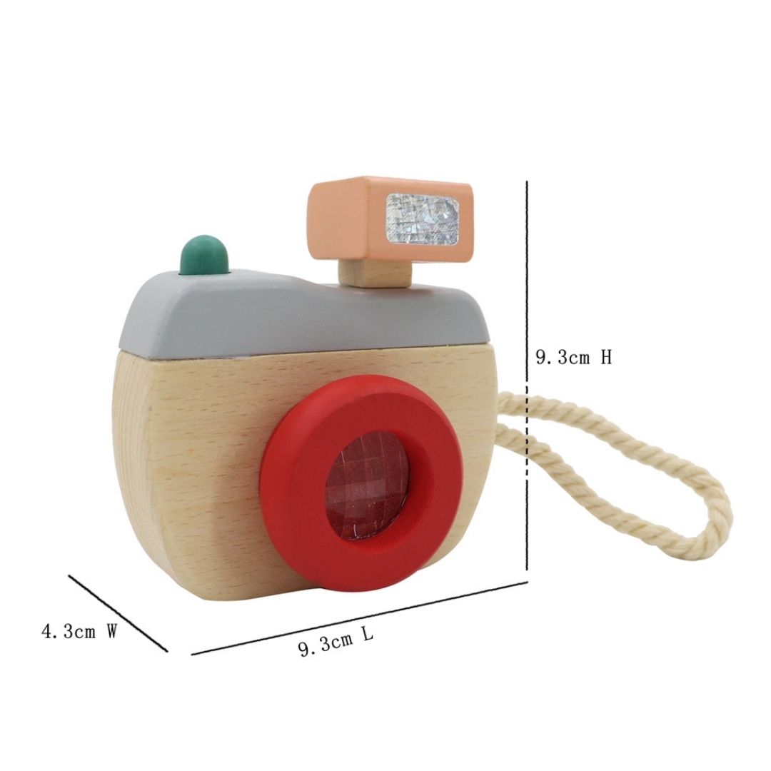 Made from solid timber, this beautifully finished pretend play camera is painted in non toxic paint and features a prism kaleidoscope to look through and see amazing patterns