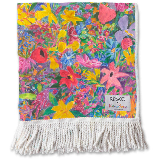 The Kip & Co x Ken Done Butterfly Dreams Terry Beach Towel features a tropical floral wonderland in beautiful, bright, multicoloured hues.  Available in store and online at Kip & Co stockist Not Plain Jane