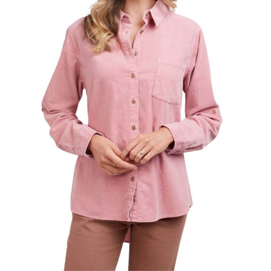 Featuring a chest patch pocket, back pleat and scooped hem the Cecelia Cord Shirt from Elm is made from a soft dusty pink cord. A great additional layer item coming into winter.