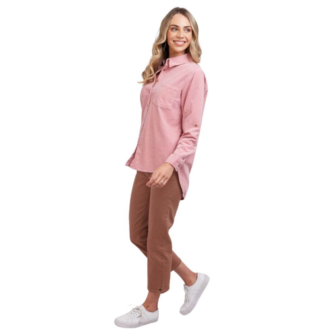 Featuring a chest patch pocket, back pleat and scooped hem the Cecelia Cord Shirt from Elm is made from a soft dusty pink cord. A great additional layer item coming into winter.