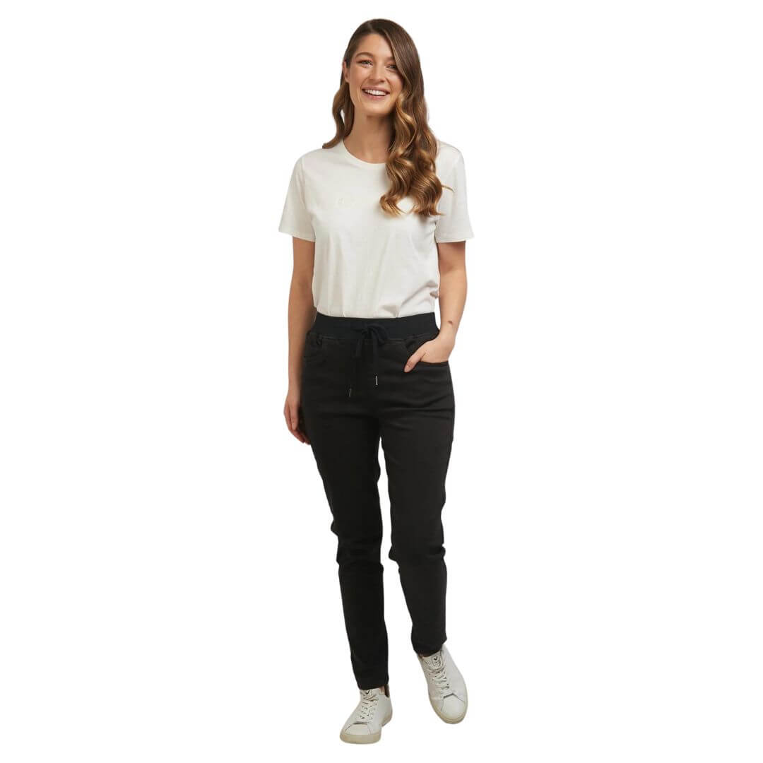 The black Sylvia joggers  from Foxwood Clothing feature 2 side pockets, 2 back pockets, and an elastic waistline with a soft drawstring. Available in store and online at Foxwood Clothing stockist Not Plain Jane.