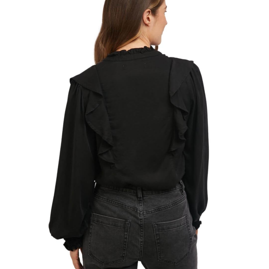 The Cleo Shirt from Foxwood Clothing is a stunning desk  dance floor black shirt featuring a soft shoulder and collar ruffle
