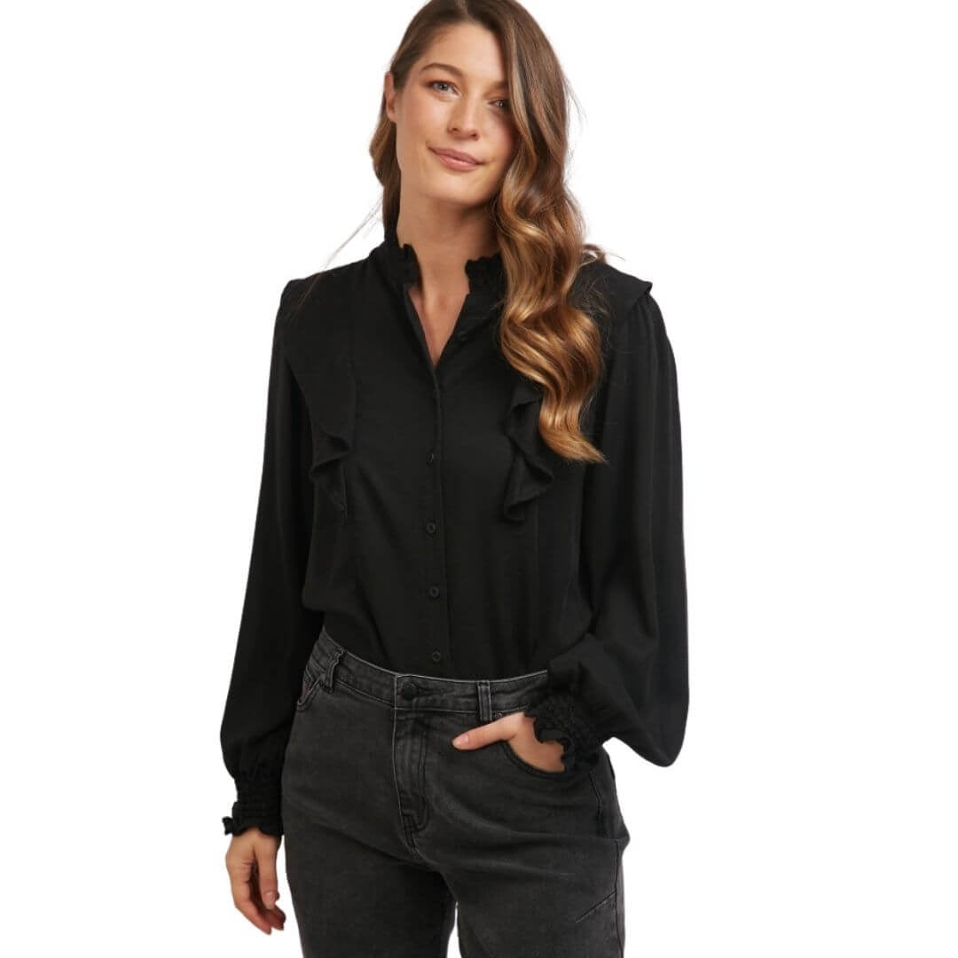 The Cleo Shirt from Foxwood is a stunning desk  dance floor black shirt featuring a soft shoulder and collar ruffle