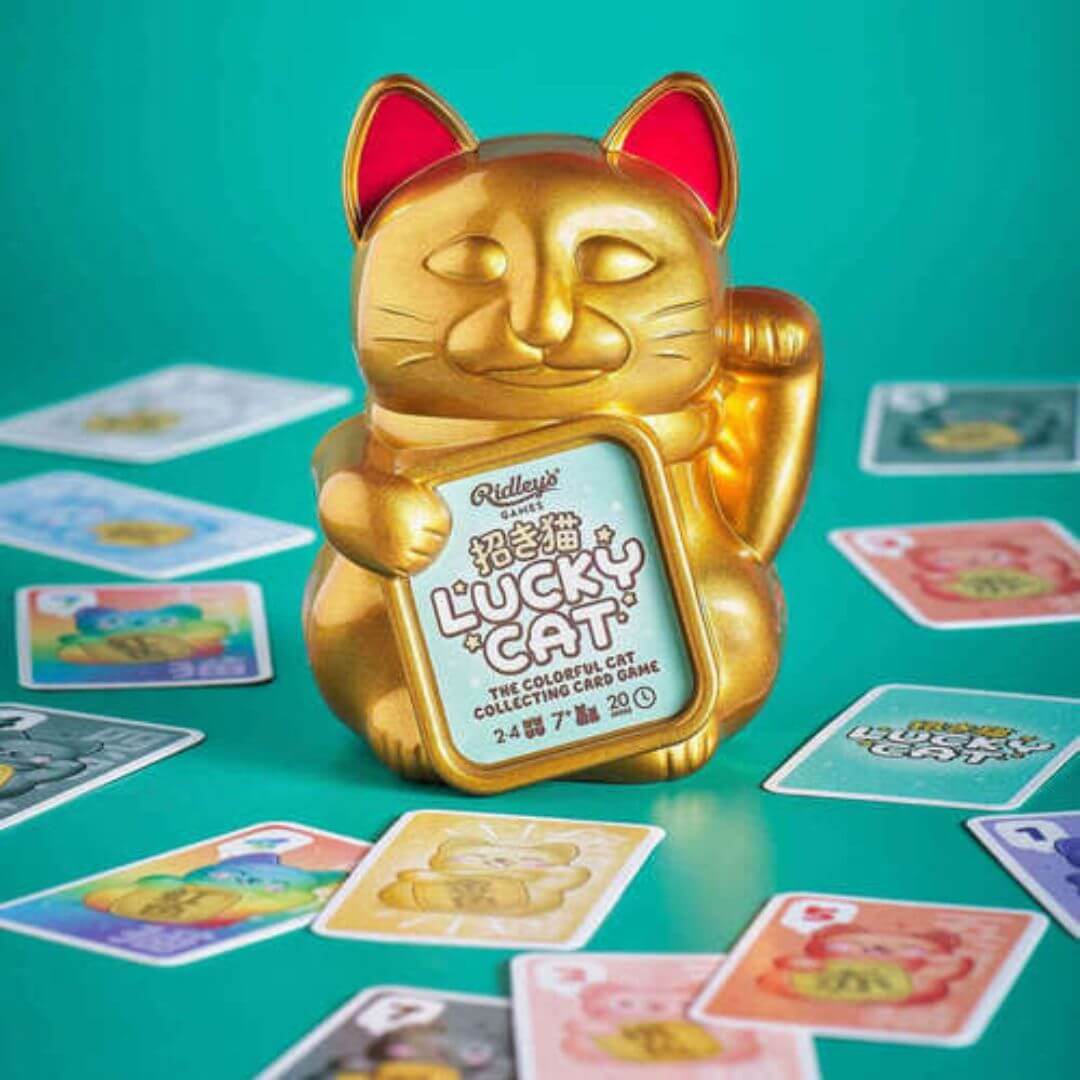 Lucky Cat Card Game in golden lucky cat storage container.