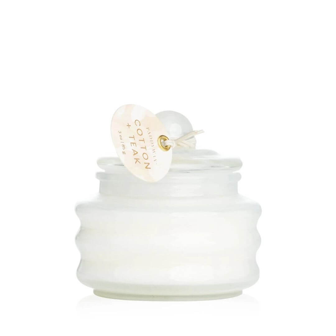 The Cotton & Teak Beam candle is made from cruelty free soy wax and is cased in a reusable white glass jar with lid.