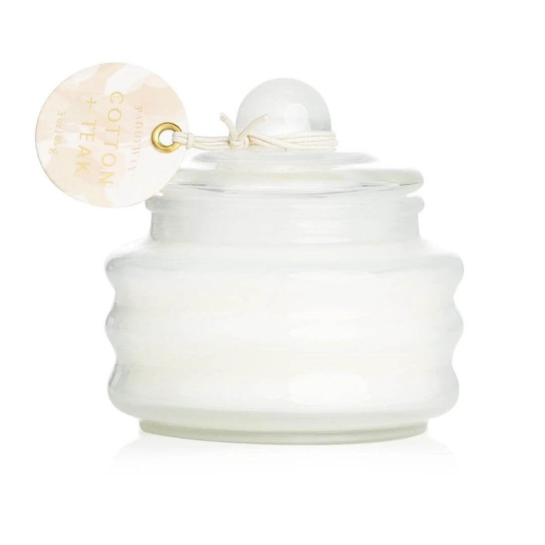 The Cotton & Teak Beam candle is made from cruelty free soy wax and is cased in a reusable white glass jar with lid.