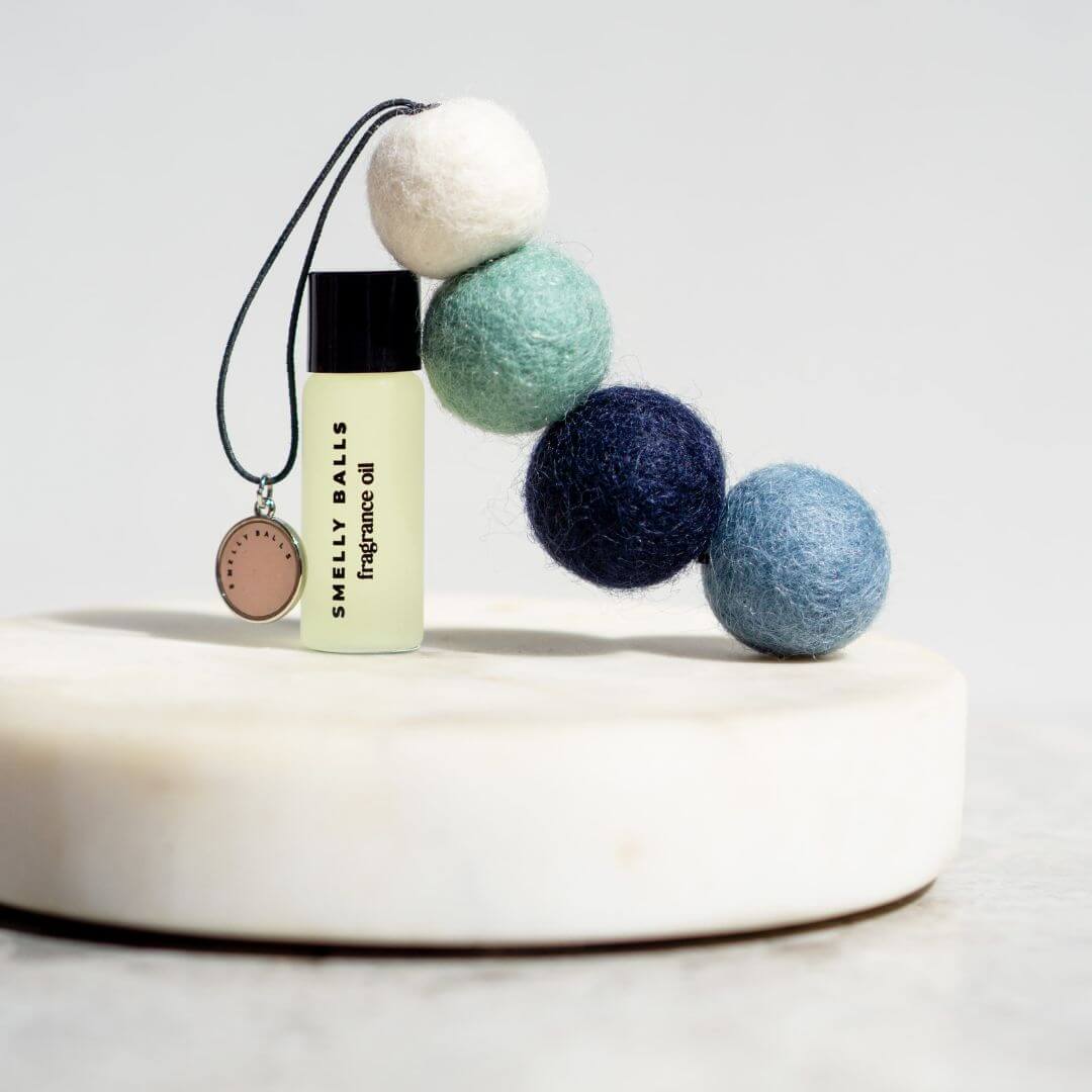 Smelly Balls are a reusable car freshener. The Seapink Smelly Balls pack features 4 unscented felt balls in Salty White, Sea Green, Deep Blue and Aegean Bluel and comes with a 5ml bottle of your chosen scent. 