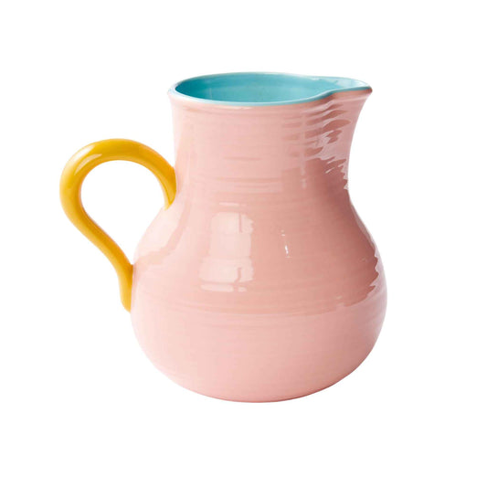 Made in collaboration with renowned ceramicist Robert Gordon, Kip & Co have created this block colour jug in pale coral pink with blue inside and yellow handle.. Perfect for home made sangria, lemonade or delicious fruit punch!